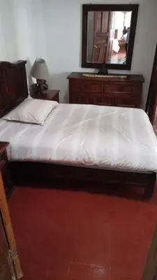 Cama o camas de una habitación en Departamento en Taxco 2 Habitaciones 5 huespedes Estacionamiento Gratis