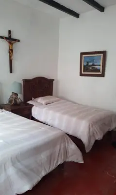 Cama o camas de una habitación en Departamento en Taxco 2 Habitaciones 5 huespedes Estacionamiento Gratis