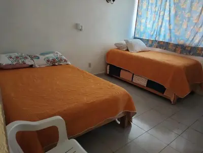 Cama o camas de una habitación en Casa Mixtecos habitación 1