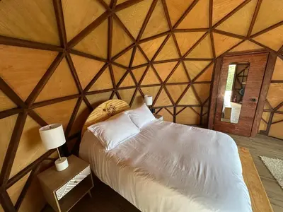 Cama o camas de una habitación en Gaiatri Holistic Glamping