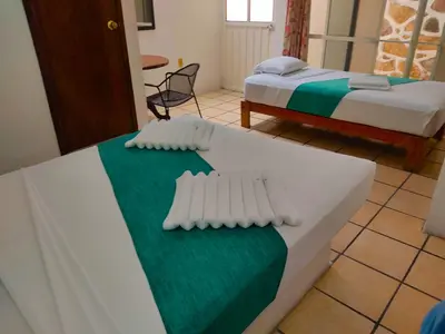 Cama o camas de una habitación en Ameyali Teques