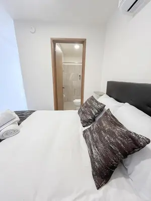 Cama o camas de una habitación en Casa Chula - Apartment in downtown Oaxaca