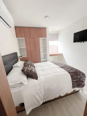 Cama o camas de una habitación en Casa Chula - Apartment in downtown Oaxaca