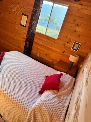 Cama o camas de una habitación en Quetzalli Rancho Sagrado