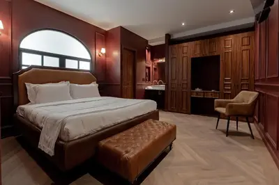 Cama o camas de una habitación en The Urban Muse suite