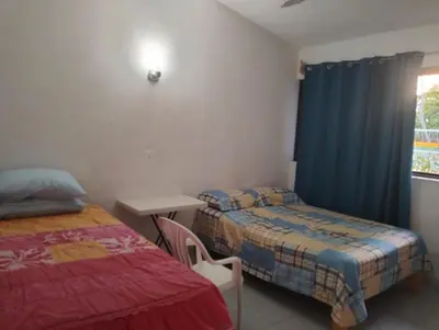 Cama o camas de una habitación en Cuarto 2 casa Mixtecos