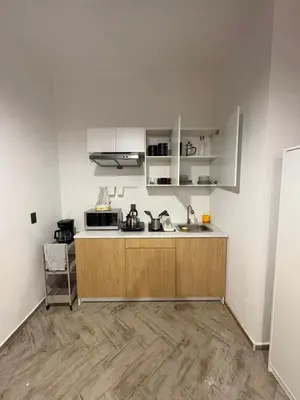 Una cocina o zona de cocina en Loft ËNXË Boutique Habitación Olivo