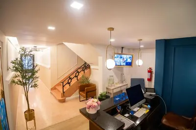 Una televisión o centro de entretenimiento en Priede Hotel Boutique