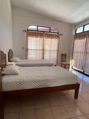 Cama o camas de una habitación en Casa Xicarú complete