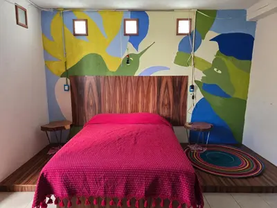 Cama o camas de una habitación en Casa del Árbol Hostel Xochimilco