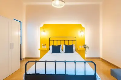 Cama o camas de una habitación en Casa céntrica con 4 habitaciones y estacionamiento