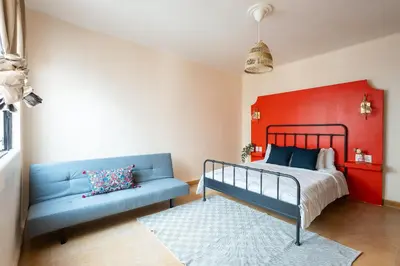 Cama o camas de una habitación en Casa céntrica con 4 habitaciones y estacionamiento