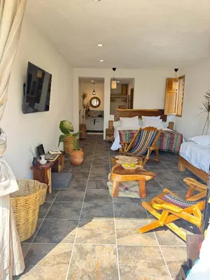 Una televisión o centro de entretenimiento en Casa Icaco, Naturaleza y calma junto al mar