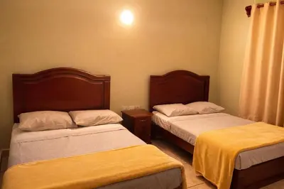 Cama o camas de una habitación en Hotel Real de Cortés