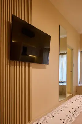 Una televisión o centro de entretenimiento en Casa Eucaliptos
