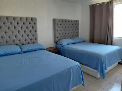 Cama o camas de una habitación en Villas la palma