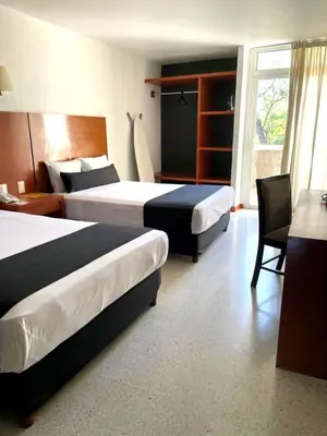 Cama o camas de una habitación en Hotel Central