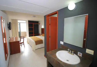 Cama o camas de una habitación en Hotel Central