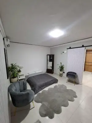 Cama o camas de una habitación en suites vergel planta alta