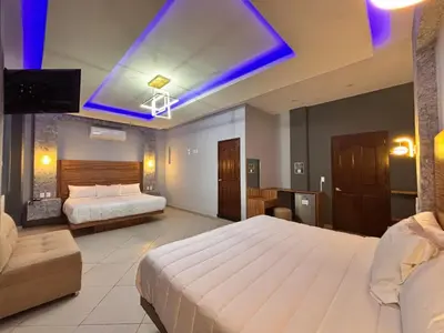 Cama o camas de una habitación en Grand Hotel Iguala