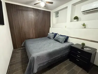 Cama o camas de una habitación en Suite La Lomita #2 climatizada