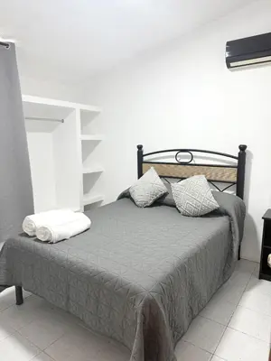 Cama o camas de una habitación en Casa Azul Guelaguetza