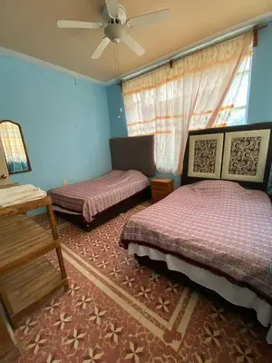 Cama o camas de una habitación en Casa de los Abuelos