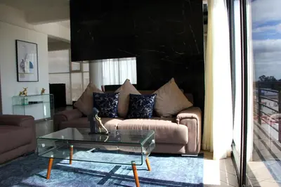 Zona de estar de Penthouse with Glass Floor and Volcano View
