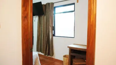 Una televisión o centro de entretenimiento en Casa Helechos