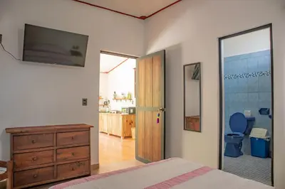 Una televisión o centro de entretenimiento en Casa Helechos