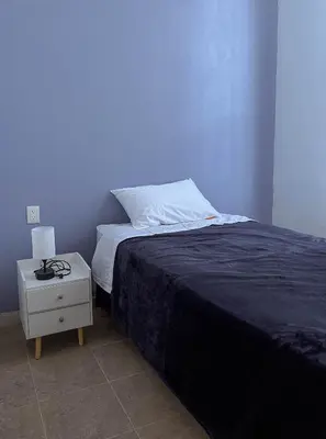 Cama o camas de una habitación en Depa centrico a 4 min de Santo Domingo caminando