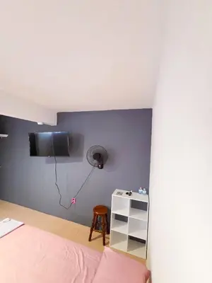 Una televisión o centro de entretenimiento en Habitación estándar tancitaro