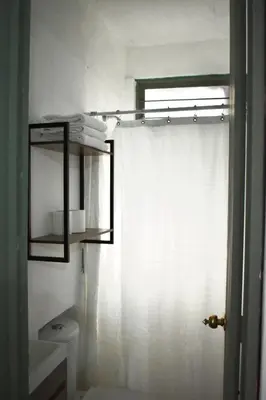 Cama o camas de una habitación en Casita en el centro de Oaxaca cerca de Santo Domingo