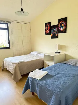 Cama o camas de una habitación en Casa Residencial en Puebla