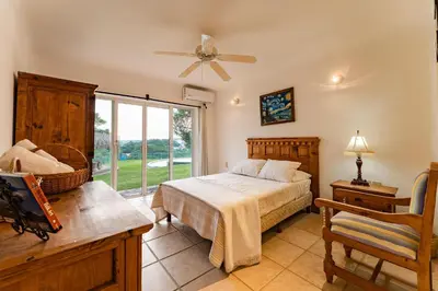 Cama o camas de una habitación en 3076 - Villa Xcaanda