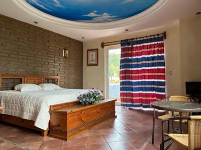 Cama o camas de una habitación en Habitación para tres a 25 minutos del centro de Oaxaca