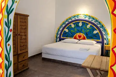Cama o camas de una habitación en Kaia Beach Hotel