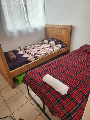 Cama o camas de una habitación en Sauces beautiful home