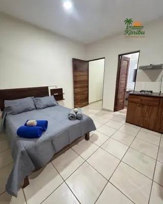 Cama o camas de una habitación en Karibu