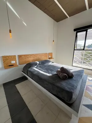 Cama o camas de una habitación en NoMADIK