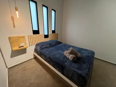Cama o camas de una habitación en NoMADIK