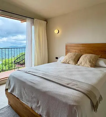 Cama o camas de una habitación en Cabañas Las Camelias