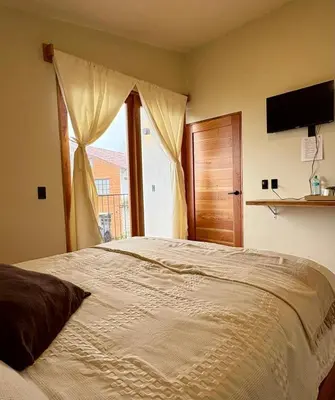 Cama o camas de una habitación en Cabañas Las Camelias