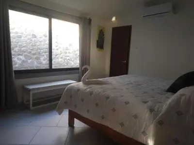 Cama o camas de una habitación en Bonanza Garden