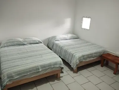 Cama o camas de una habitación en Cómodas Casas en el centro de Coatepec Veracruz
