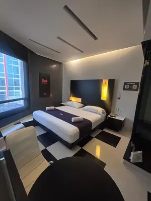 Cama o camas de una habitación en Auto Hotel Via Uno
