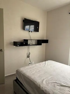 Una televisión o centro de entretenimiento en Casa punta mar Acapulco