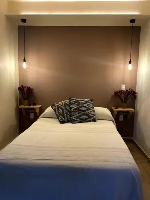 Cama o camas de una habitación en 1-Bed Loft in Oaxaca - Steps from Downtown