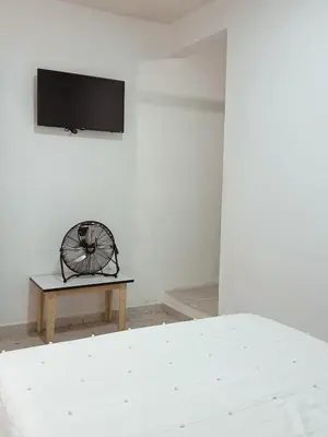 Una televisión o centro de entretenimiento en Casa en el Centro 7BR para 16 personas