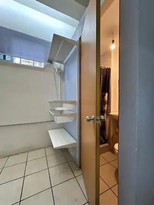 Un baño de Habitación con baño privado para 1 persona cerca del ESTADIO AZTECA-BANORTE